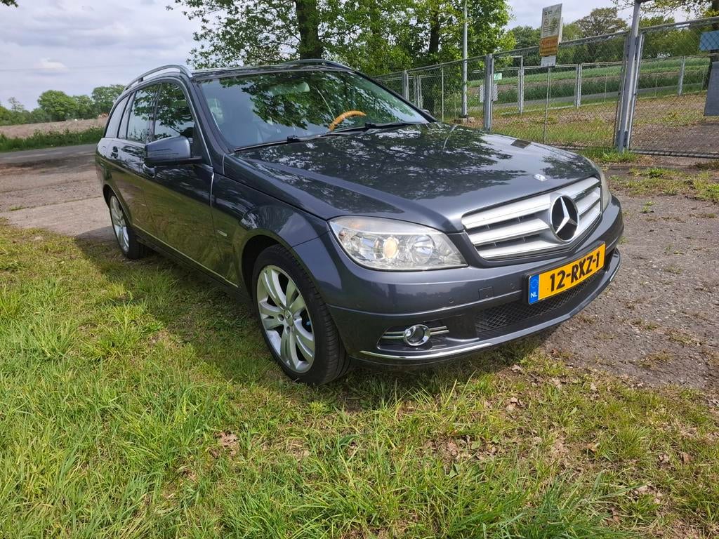 Mercedes-Benz C-Klasse 1.8 C180 CGI Estate AUT 2010 Grijs, Auto's, Achterwielaandrijving, 1800 kg, Zwart, Stationwagon
