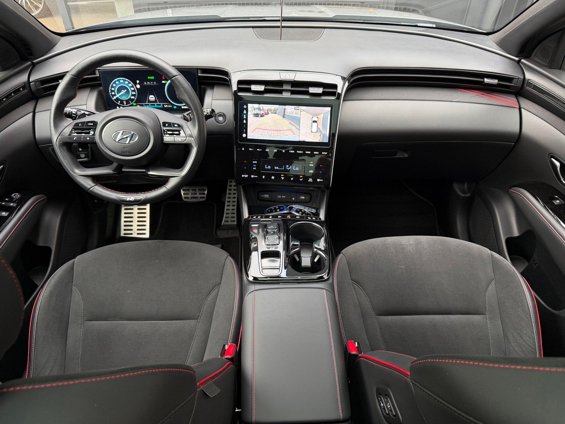 Hyundai Tucson 1.6 T-GDI HEV N Line Sky Panoramadak Full Opt, Auto's, Dealer onderhouden, Gebruikt, Zwart, 4 cilinders