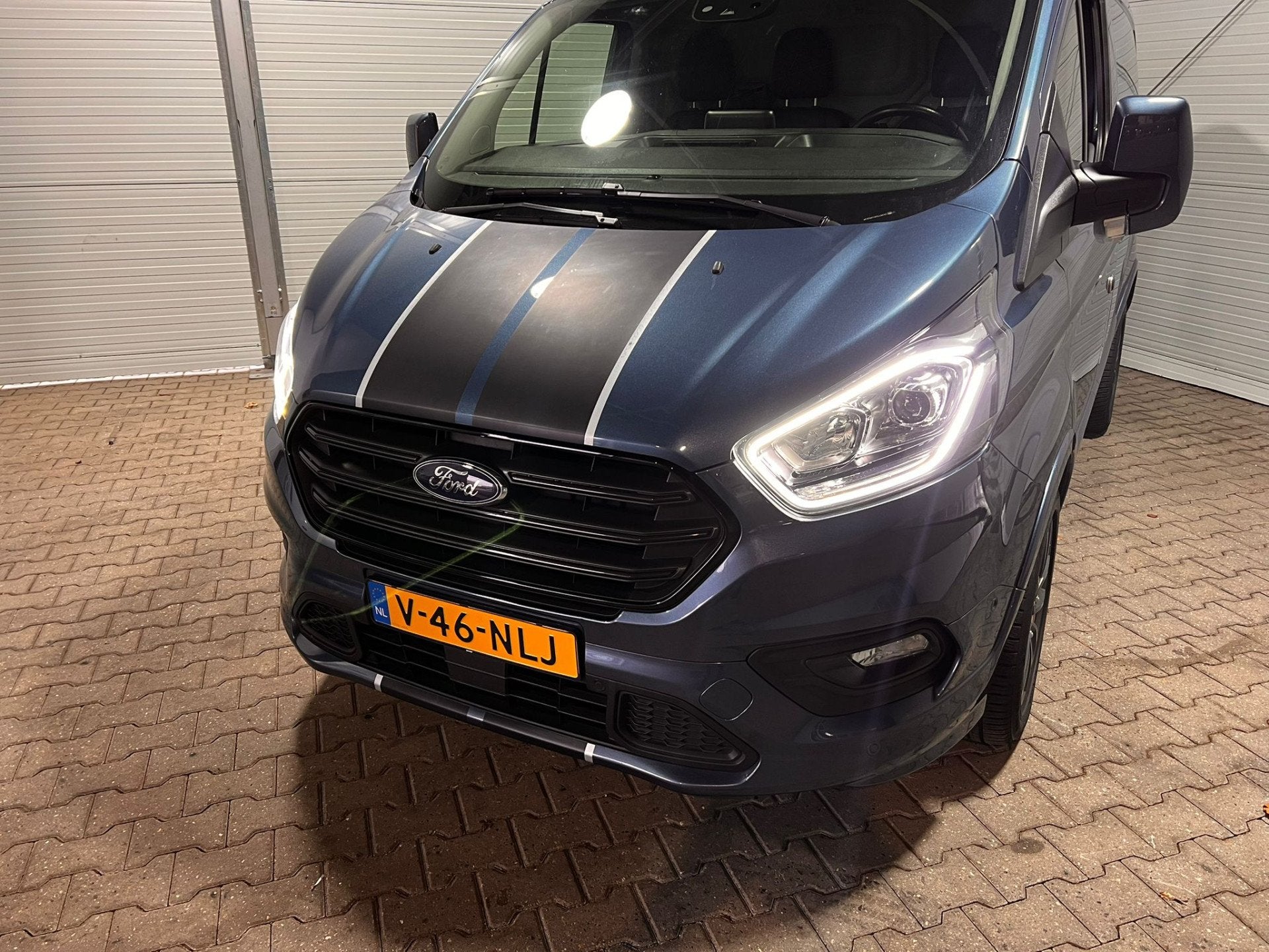 Ford Transit Custom 290 2.0 TDCI L1H1 Sport AUT, 3-Zits, LED, 15 km/l, 4 cilinders, Blauw, Leder en Stof