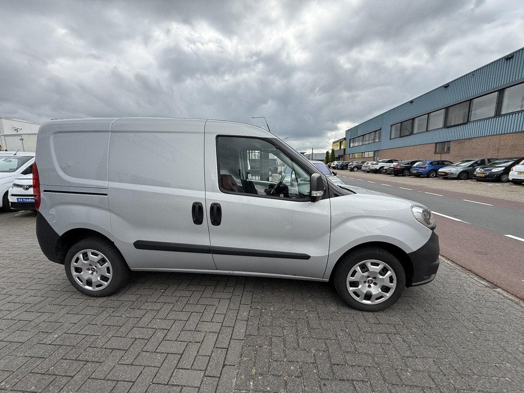 Fiat Doblò Cargo 1.4 T-Jet L1H1 SX 120Pk Benzine Volledig d, Auto's, Bestelauto's, Voorwielaandrijving, Stof, Gebruikt, 4 cilinders