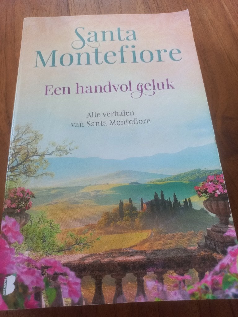 Santa Montefiore - Een handvol geluk, Boeken, Ophalen of Verzenden, Zo goed als nieuw