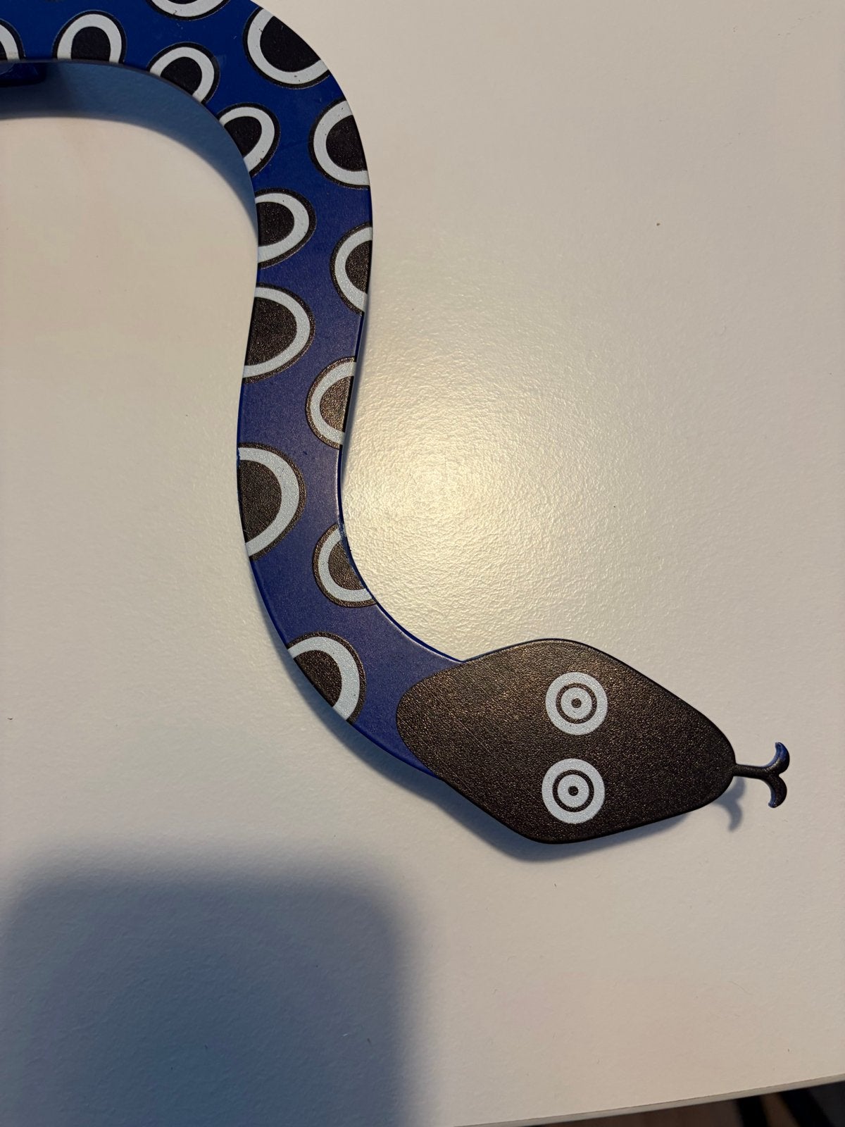 Vitra Alexander Girard Snake - Blauw met kleine kras, Ophalen, Hout, Gebruikt, Blauw