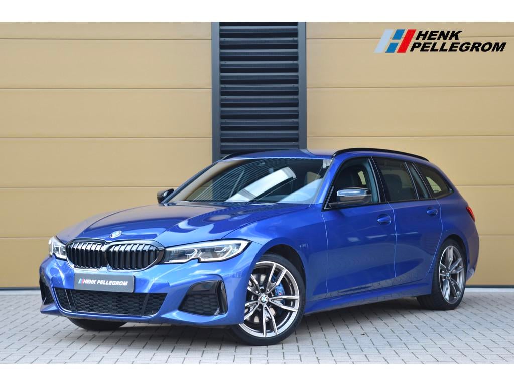 BMW 3 Serie Touring M340i xDrive High Executive * Harman / K, Auto's, BMW, Automaat, 1780 kg, Met garantie (alle), Blauw