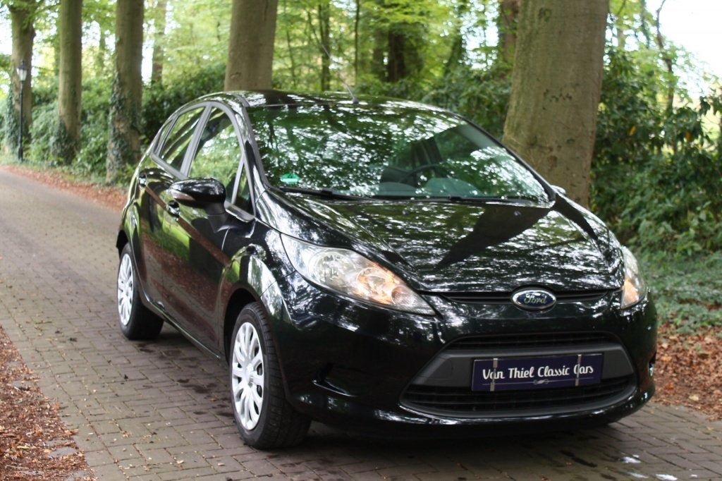 Ford Fiesta 1.25 LIMITED, STOELVERW, AIRCO (bj 2010), Auto's, Stof, 1242 cc, 82 pk, Zwart