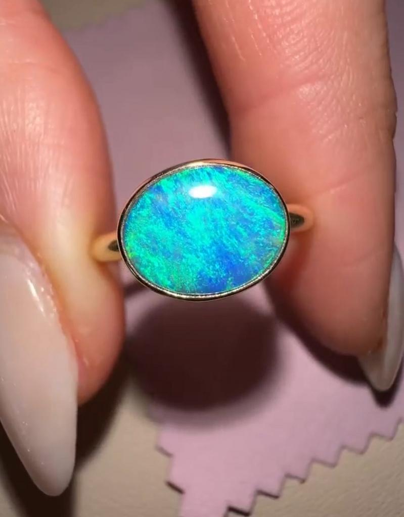 Gouden ring met authentieke Australische opaal, Nieuw, Ophalen of Verzenden, Kleiner dan 17, Met edelsteen