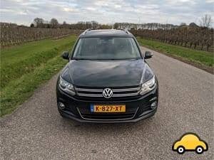Volkswagen Tiguan 1.4 TSI 118KW BMT 2014 donker Groen, Auto's, Voorwielaandrijving, 15 km/l, 750 kg, 75 €/maand