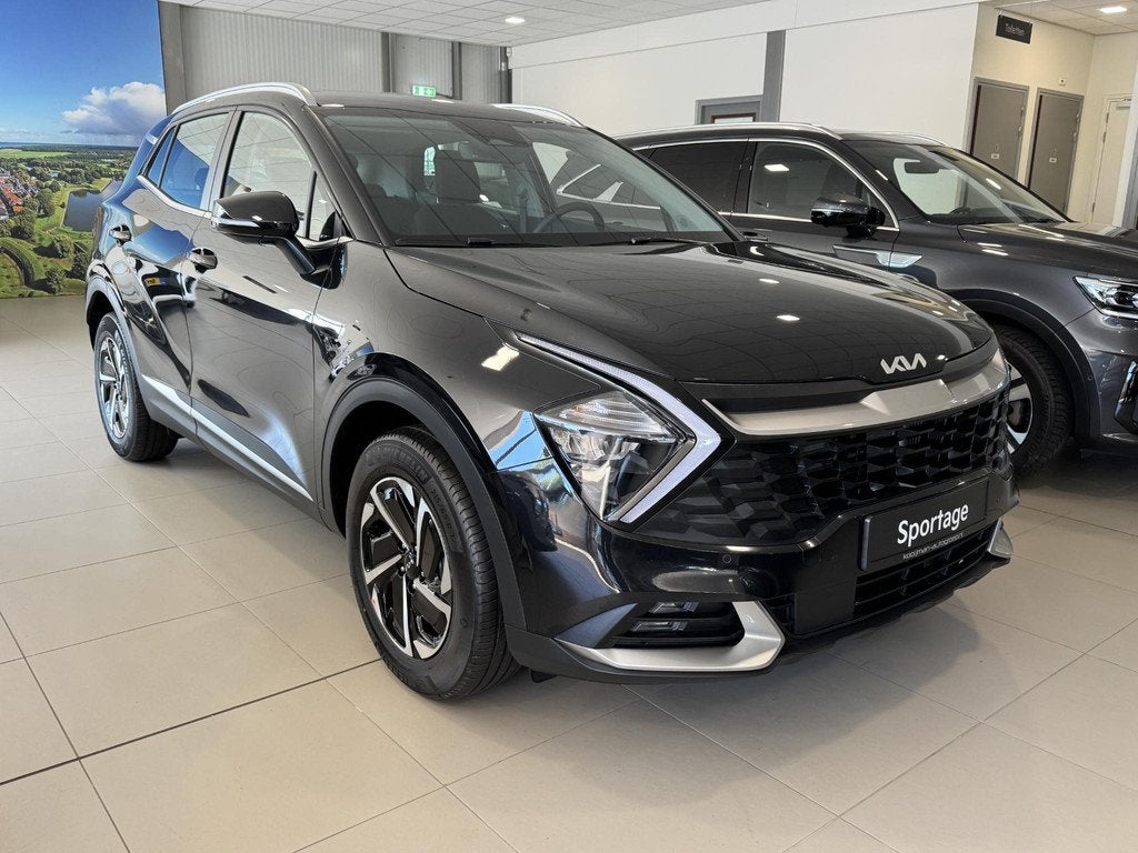 Kia Sportage 1.6 T-GDi Hybrid DynamicLine NIEUW! DIRECT RIJD, Auto's, Kia, Stof, Euro 6, 4 cilinders, 1360 kg
