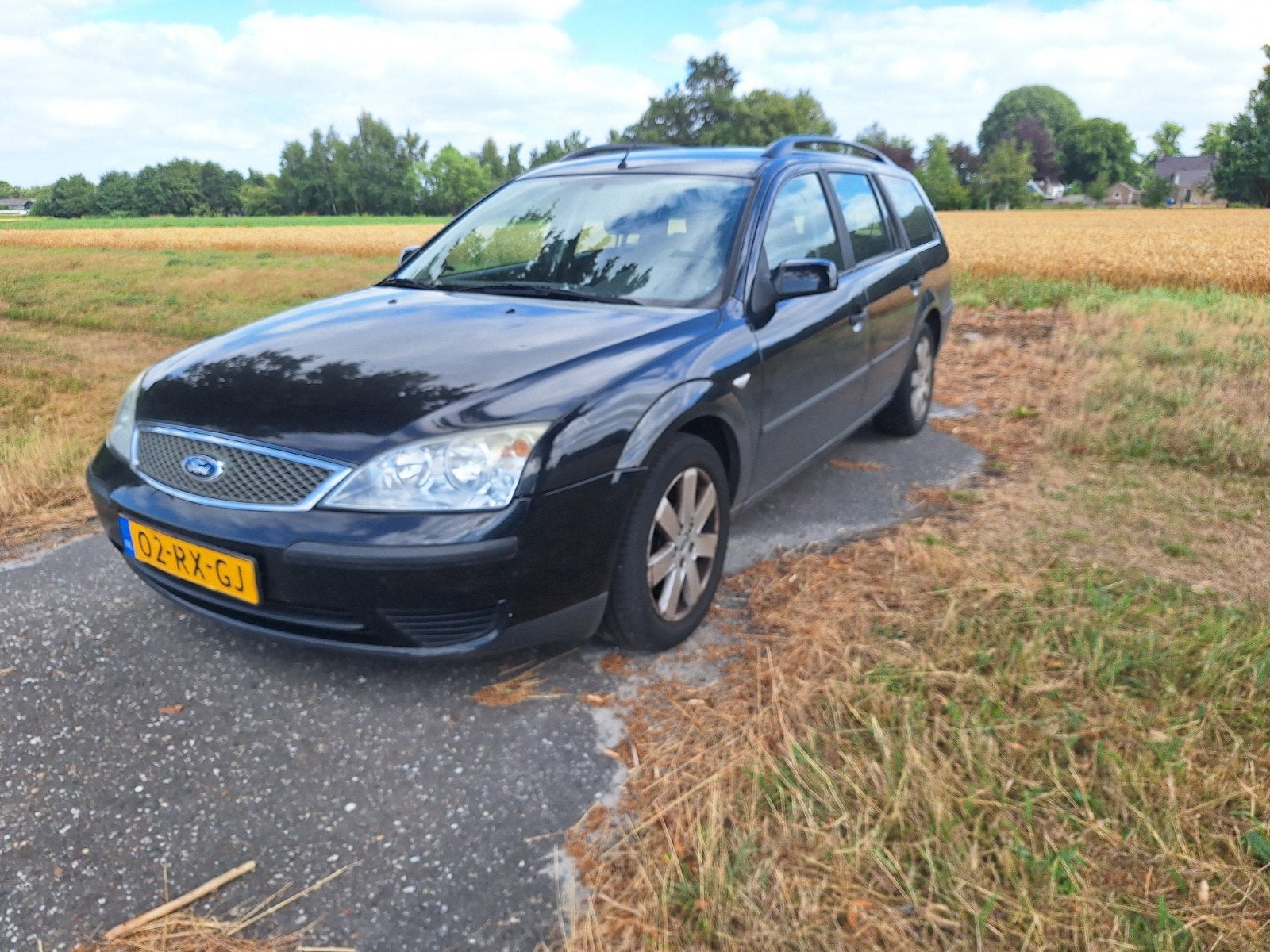 Ford Mondeo 1.8 16V 92KW Wagon 2005 Zwart T.E.A.B., 4 cilinders, Zwart, Origineel Nederlands, Stationwagon