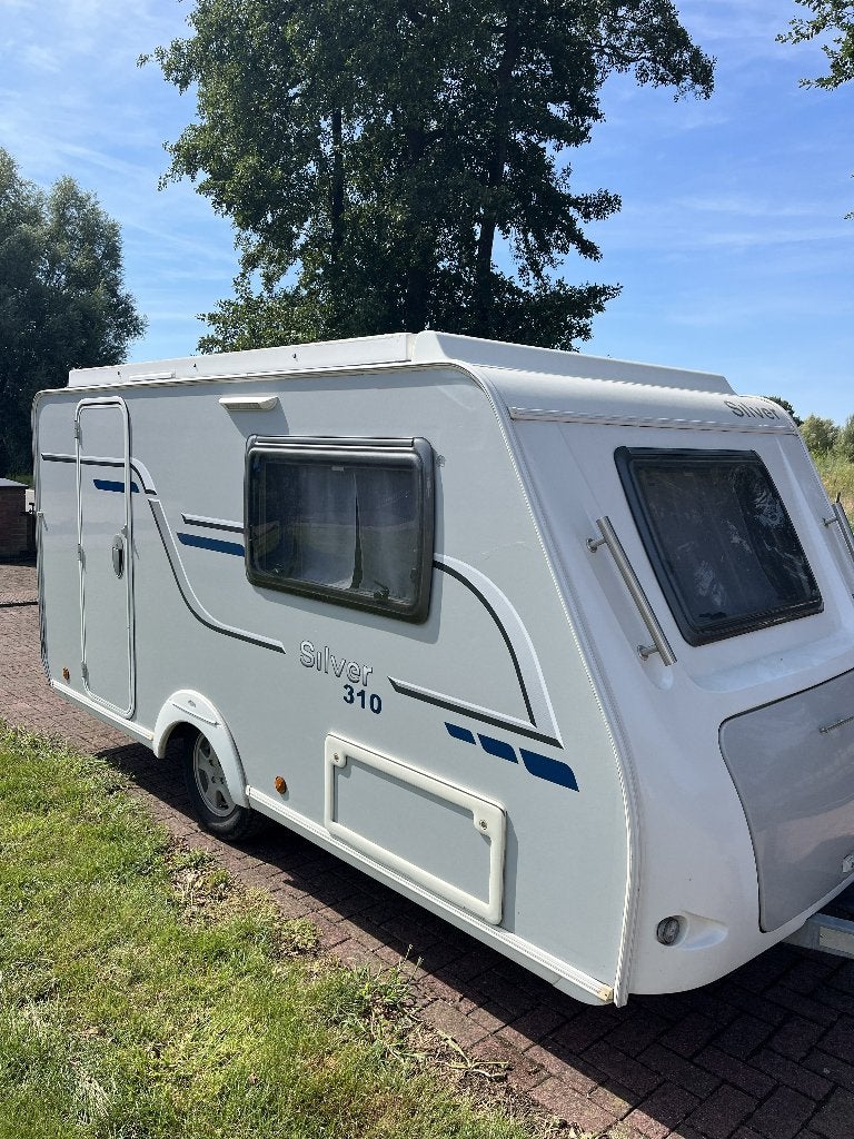 Mooie Trigano Silver 310 TLD hefdakcaravan bwjr 2015, Caravans en Kamperen, Caravans, Trigano, Tot en met 2, Schokbreker, Bedrijf