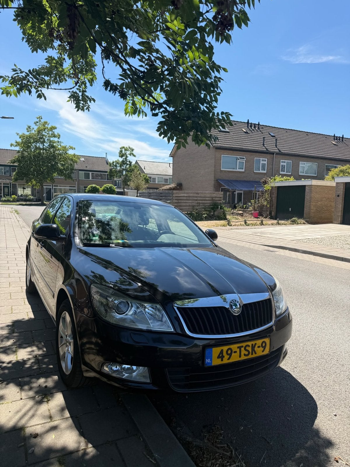 Skoda Octavia 1.2 TSI 2012 Zwart, Auto's, Voorwielaandrijving, Stof, Zwart, 4 cilinders