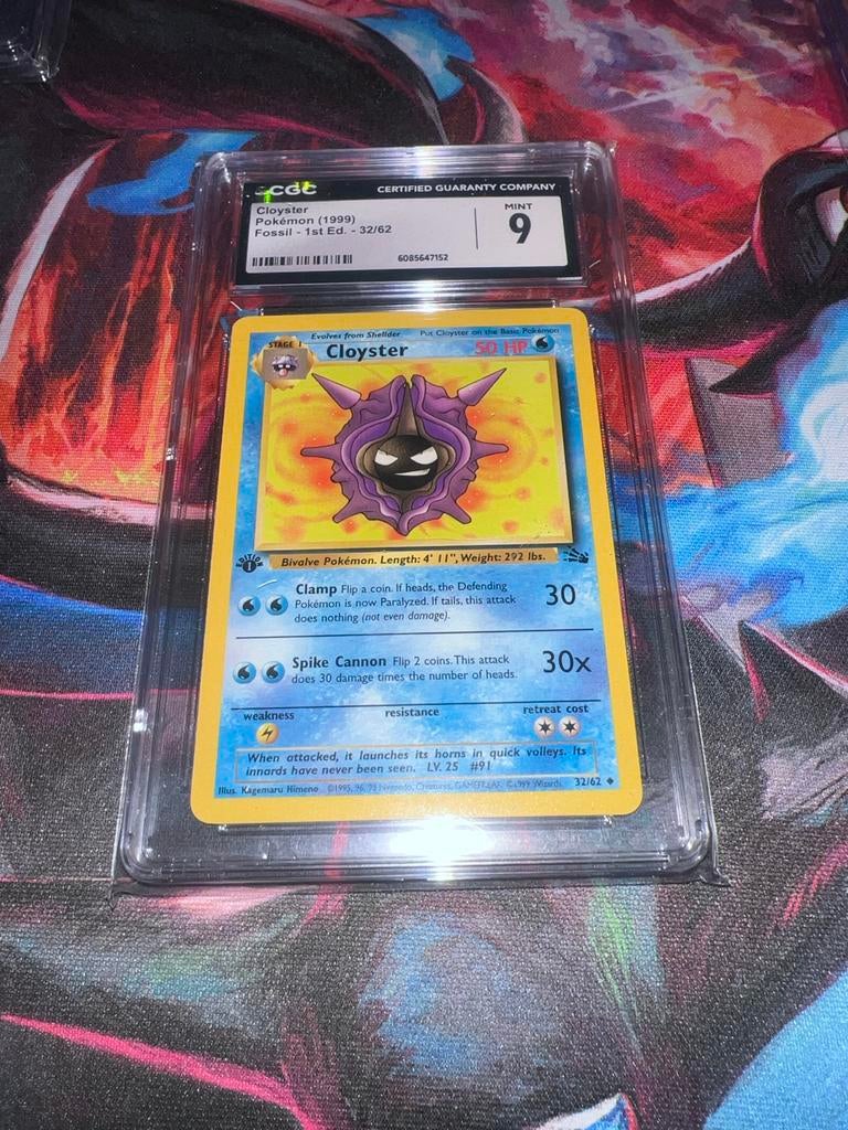 Cloyster Pokémon (1999) Fossil - 1st Ed. - 32/62 CGC 9, Ophalen of Verzenden, Zo goed als nieuw, Losse kaart