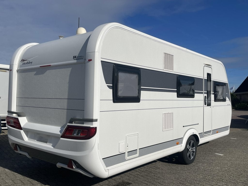 Hobby De Luxe 545 KMF MOVER/VOORTENT/TV/VLOERVERWARMING, Hobby, Bedrijf, Treinzit, Serviceluik