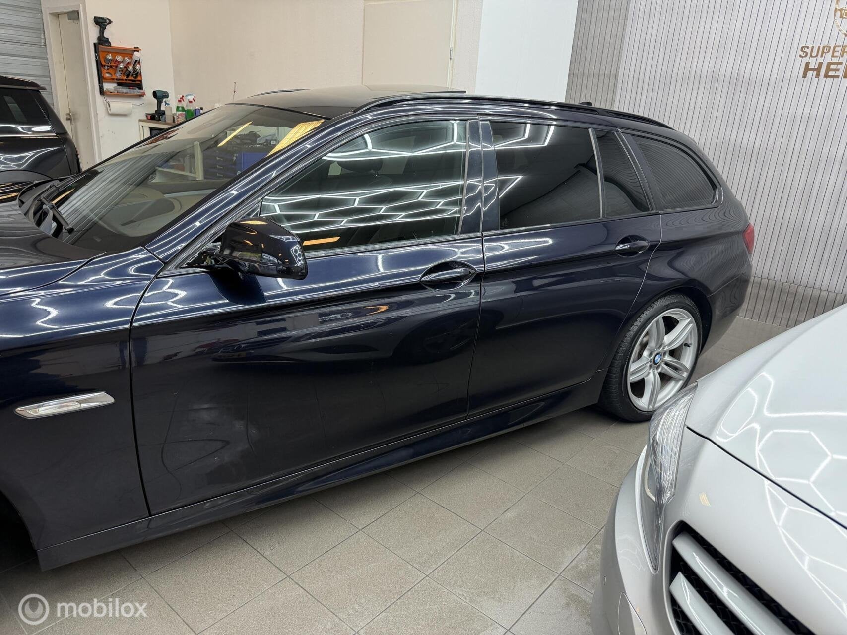 Foto 6 van BMW 5-serie Touring 520i High Executive