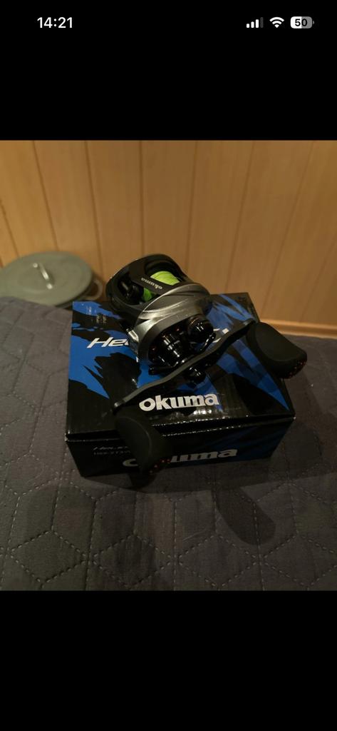 Okuma helios sx reel, Watersport en Boten, Ophalen of Verzenden, Zo goed als nieuw, Molen