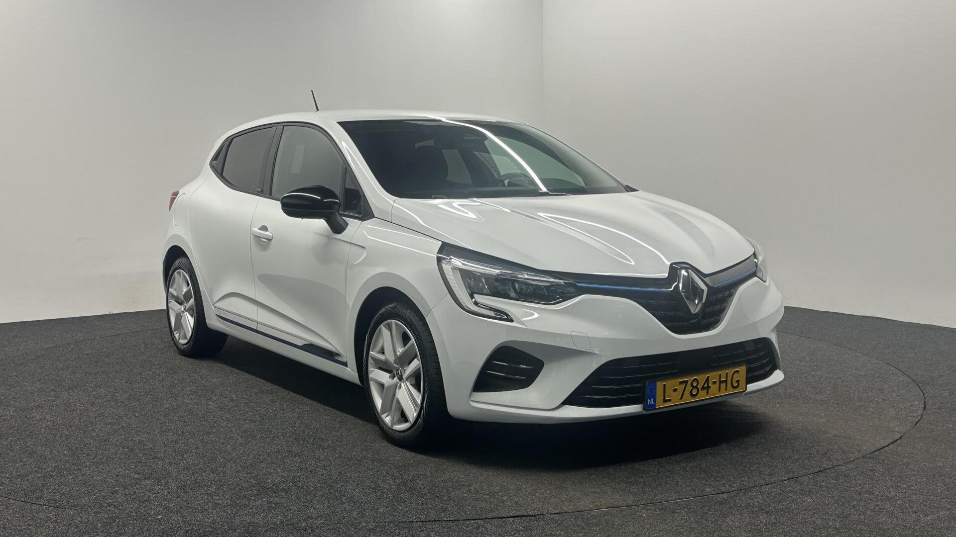 Renault Clio 1.6 E-Tech Hybrid 140 Zen CARPLAY NAVI CRUISE., Auto's, Stof, Gebruikt, 4 cilinders, Met garantie (alle)
