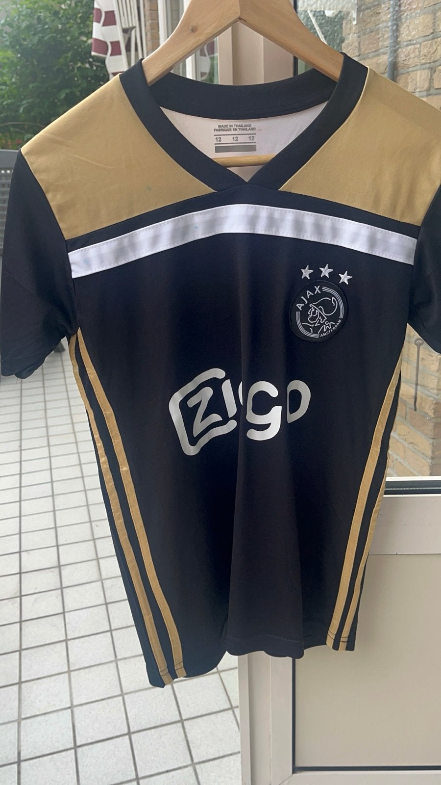 Ajax Thuisshirt Zwart Goud Maat 12 (Kindermaat), Sport en Fitness, Voetbal, Maat XS of kleiner, Ophalen of Verzenden, Gebruikt