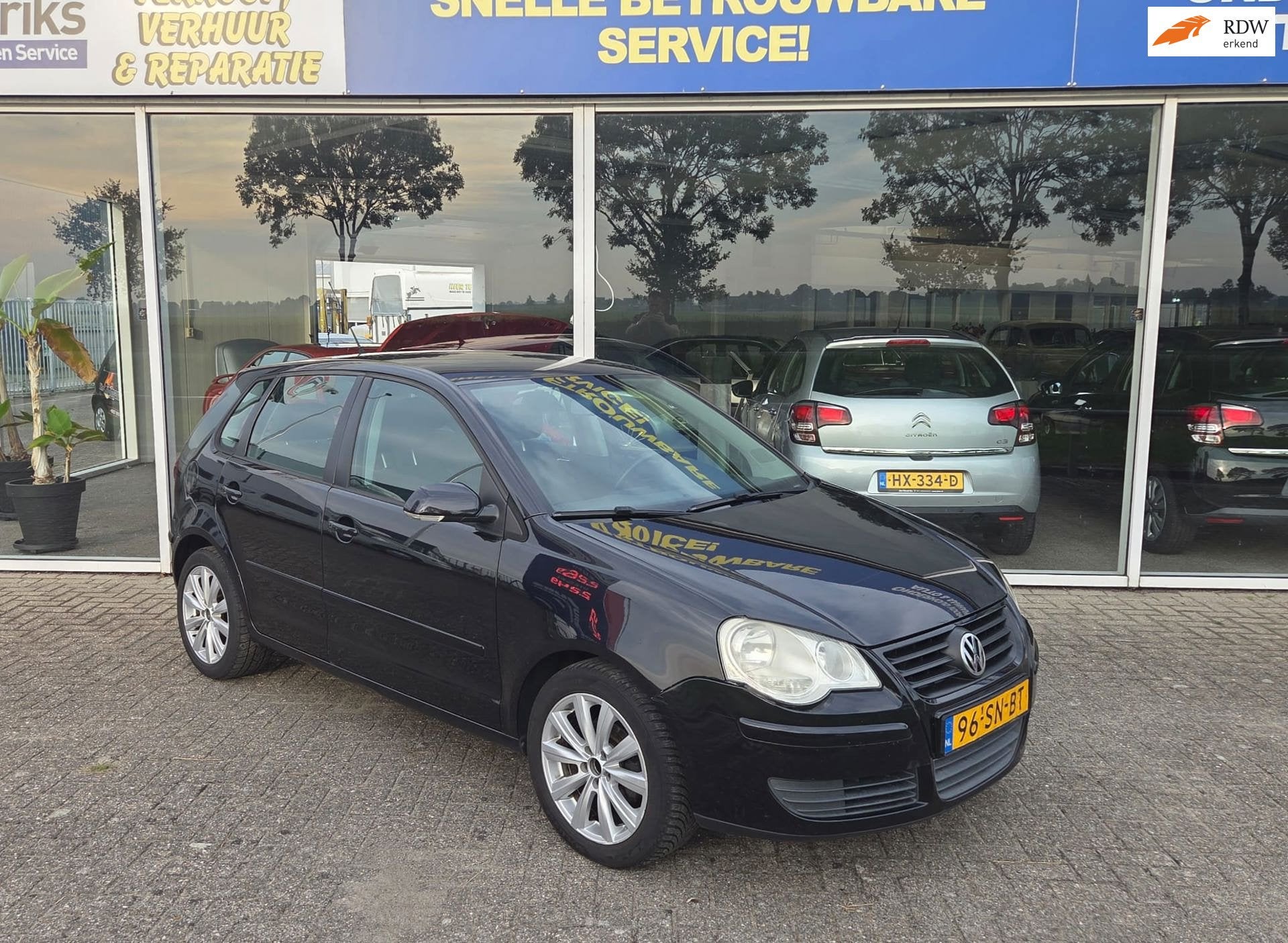 Volkswagen Polo 1.4-16V FSI Optive, Auto's, Voorwielaandrijving, Gebruikt, Zwart, Origineel Nederlands