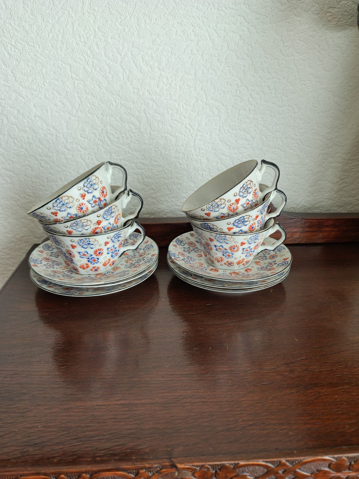 6 kopjes en schoteltjes met bloemmotief hoogte 9 dia 5.5, Antiek en Kunst, Ophalen of Verzenden