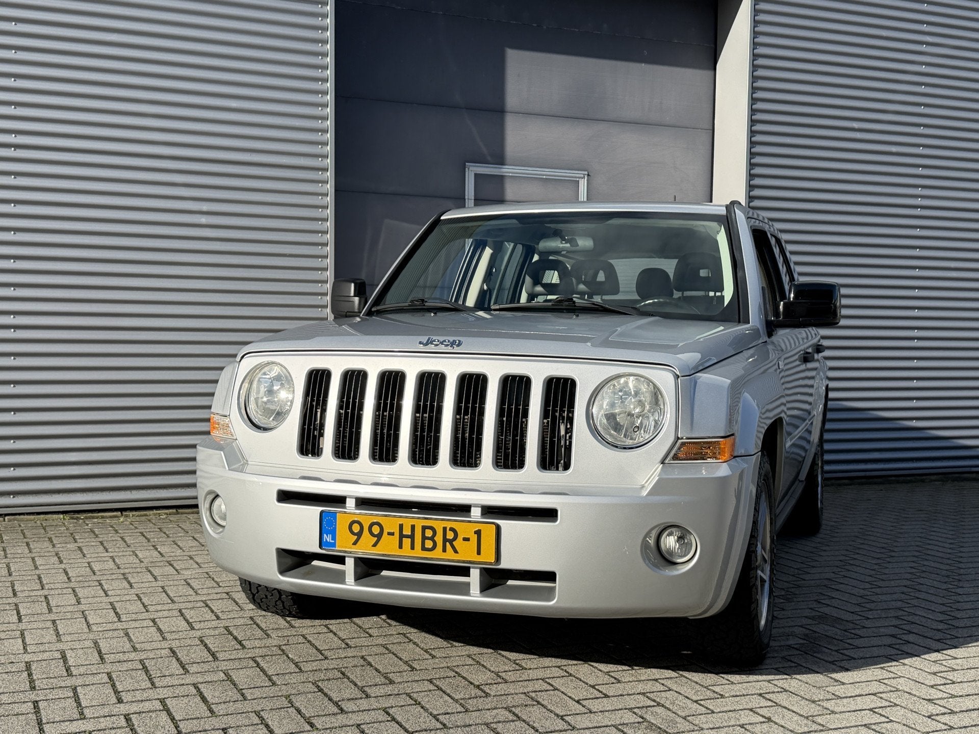 Jeep Patriot 2.4 Sport Adventure I 4x4 I Airco I Nl Auto, Auto's, Gebruikt, Zwart, 4 cilinders, Patriot