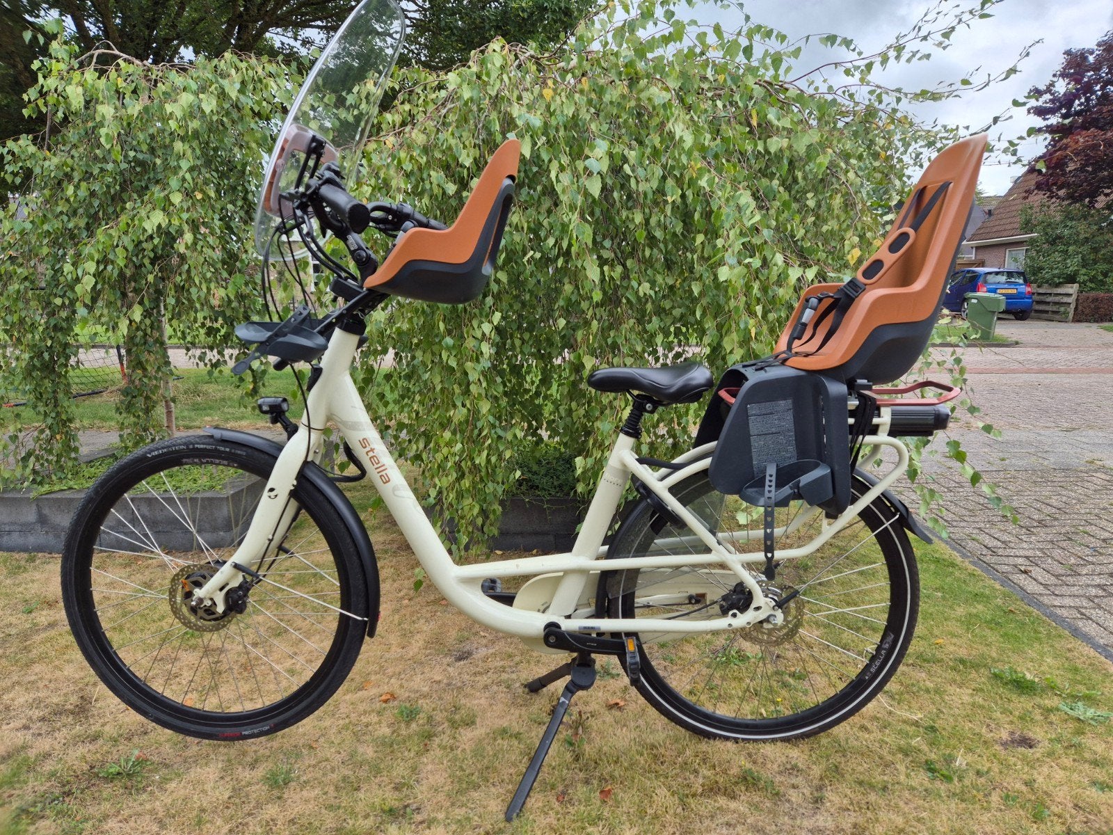Stella elektrische fiets met 2 kinderzitjes en windscherm, Overige merken, Gebruikt, Huif, Ophalen of Verzenden