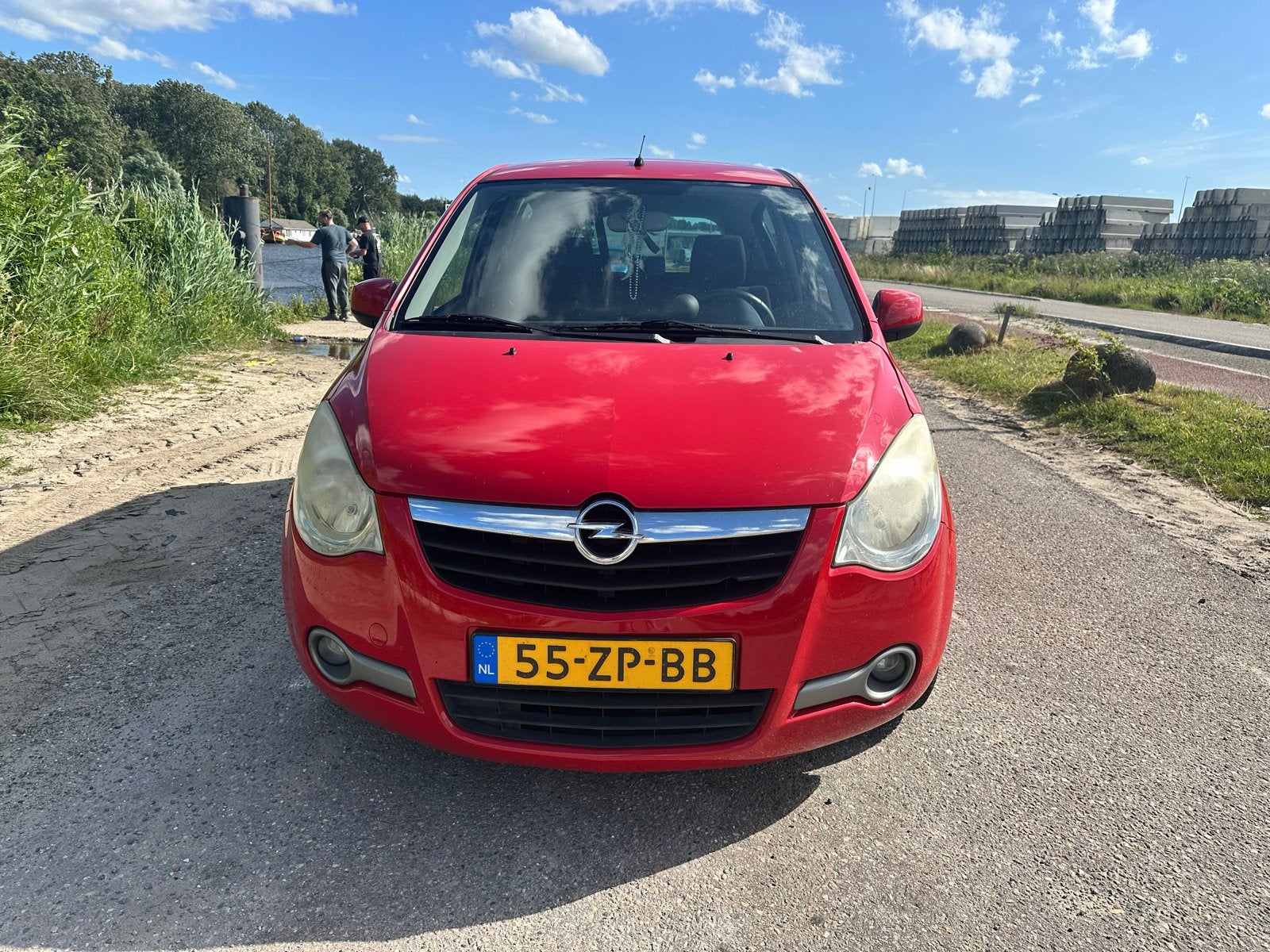 Opel Agila 1.2 16V 2009 Rood, Auto's, Voorwielaandrijving, 40 €/maand, 4 cilinders, 965 kg