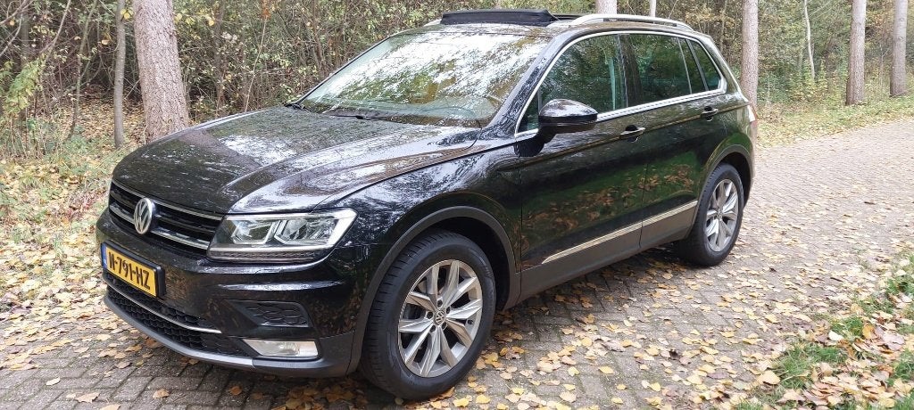 Volkswagen Tiguan 1.4 TSI DSG Highline 4Motion, Auto's, Volkswagen, Automaat, 4 cilinders, 2000 kg, Lichtsensor