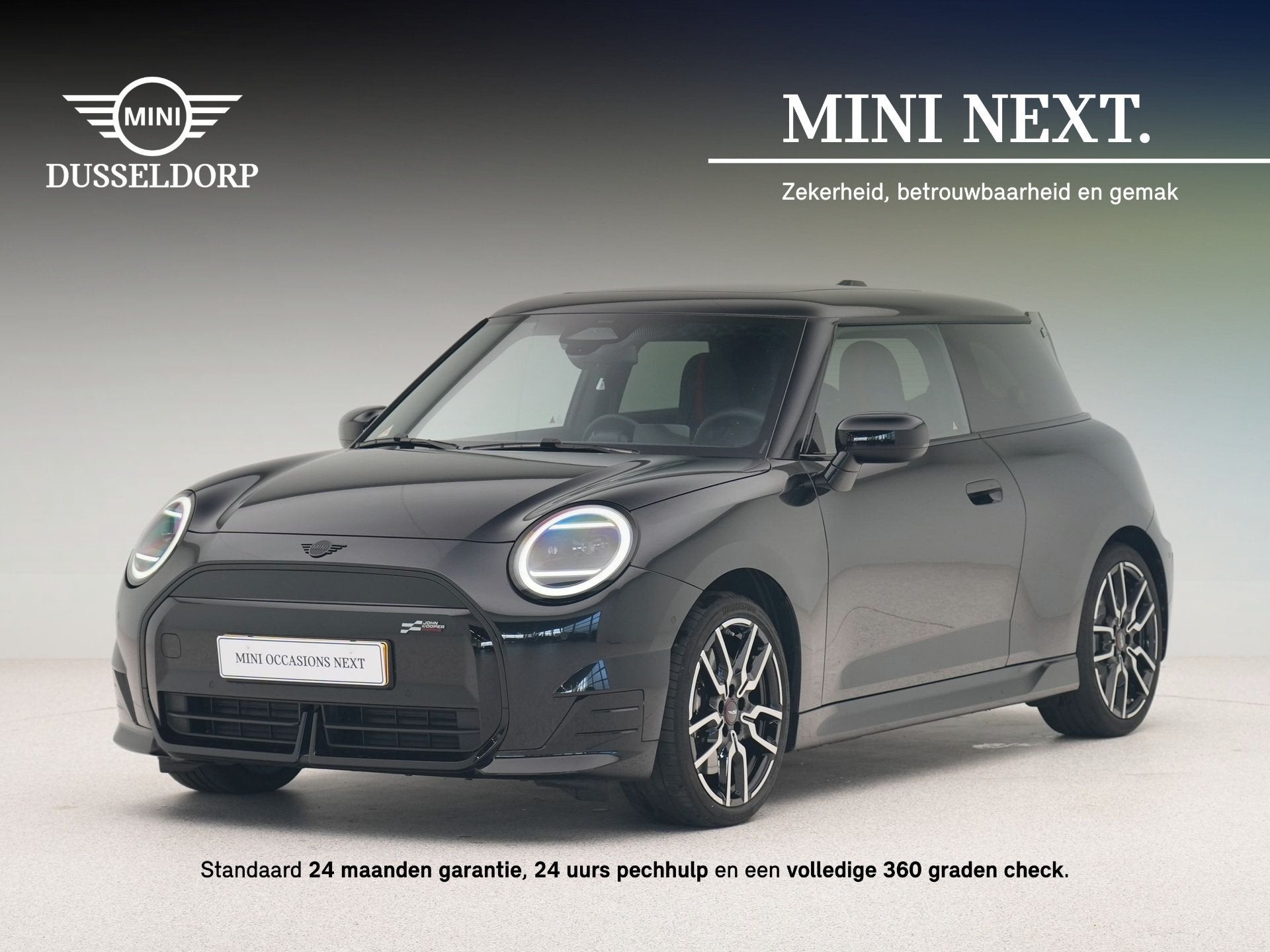 MINI Cooper E John Cooper Works Pakket M Accu conditie 95%, Auto's, Dealer onderhouden, Gebruikt, Zwart, Met garantie (alle)