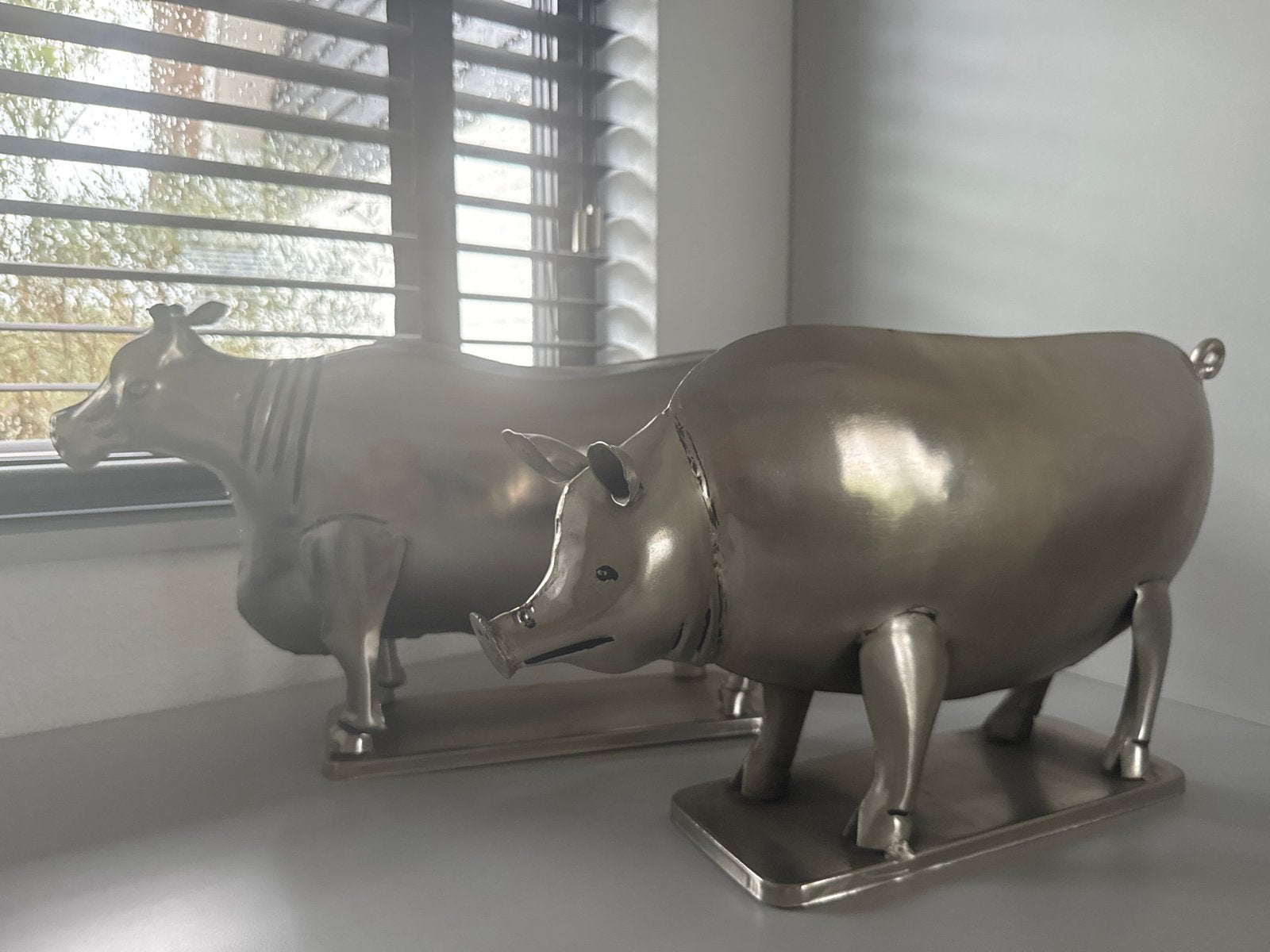 Set van 2 zilverkleurige decoratieve dierenbeelden, Ophalen of Verzenden, Zo goed als nieuw, Zilver, Metaal