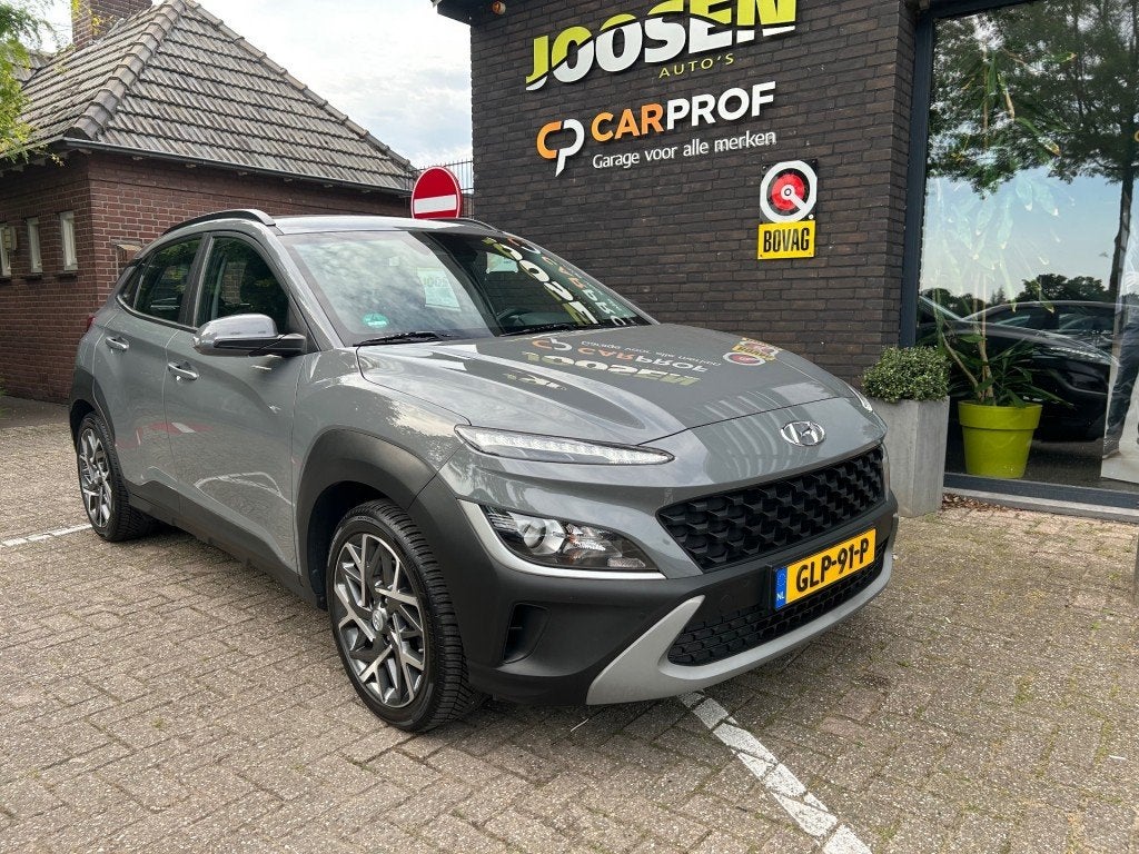 Hyundai KONA 1.6 GDI HEV PREMIUM, Auto's, Hyundai, Gebruikt, Met garantie (alle), 23 km/l, SUV of Terreinwagen
