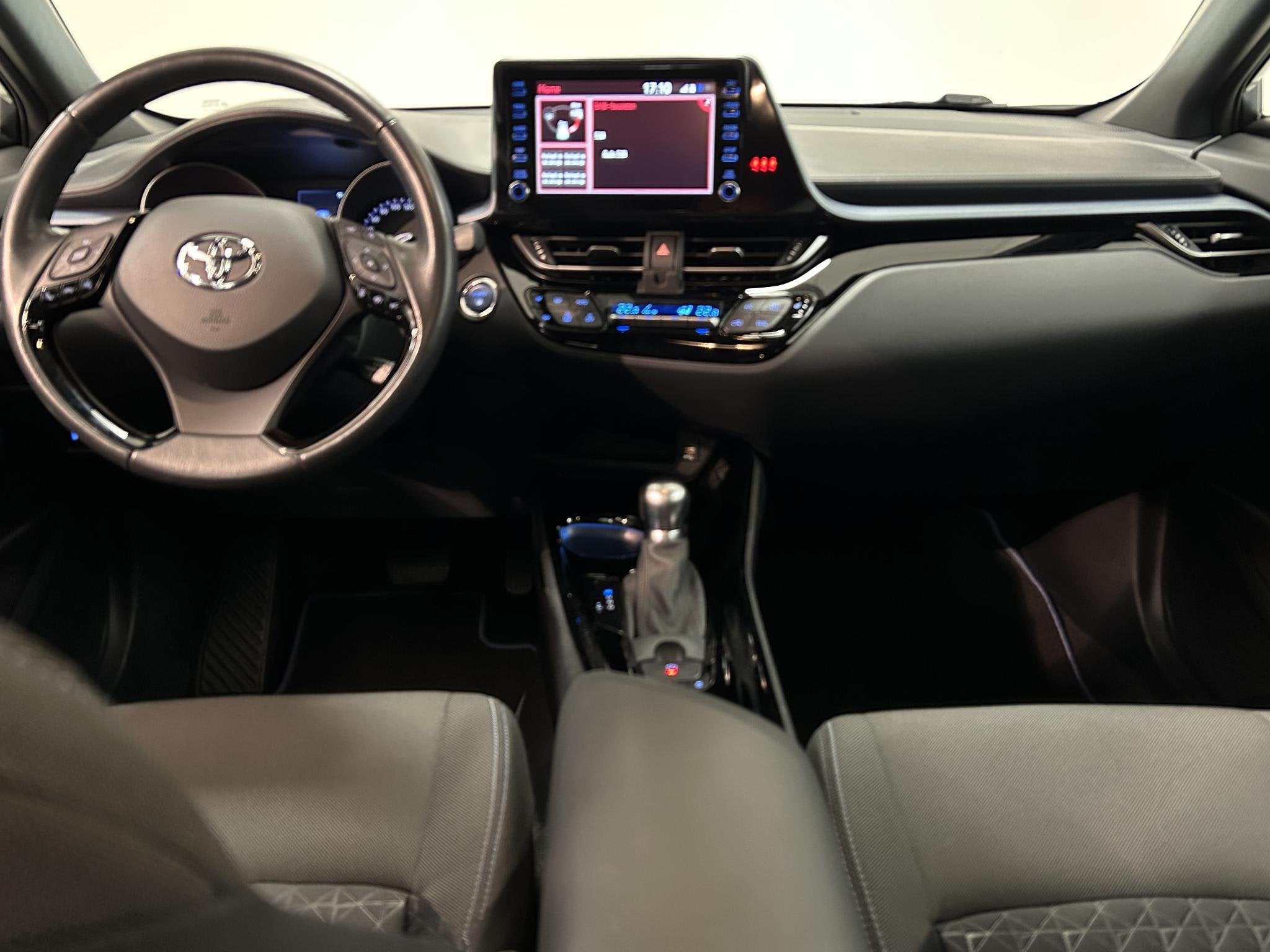 Toyota C-HR 2.0 Hybrid Business Plus | Camera | Navigatie |, Auto's, Stof, 4 cilinders, Met garantie (alle), Wit