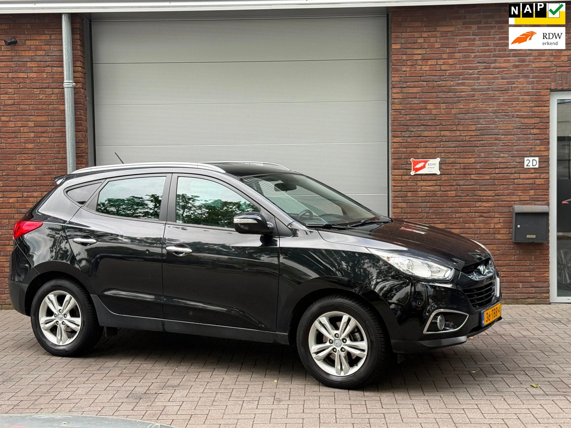 Hyundai Ix35 2.0i Style Executive|AIRCO|NIEUWE APK|AUTOMAAT, Auto's, Gebruikt, Zwart, 4 cilinders, 1600 kg