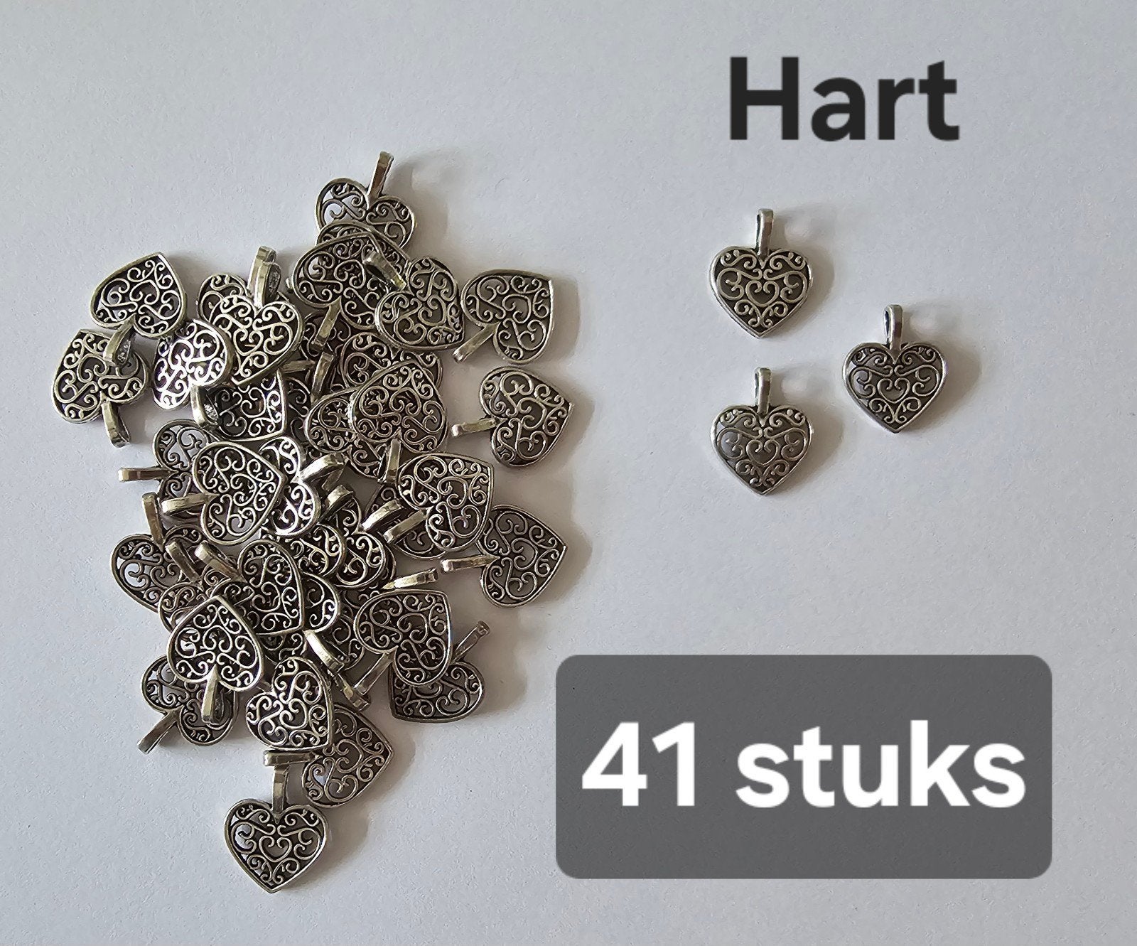 Grote partij van 323 zilverkleurige bedels, Ophalen of Verzenden, Nieuw, Overige materialen