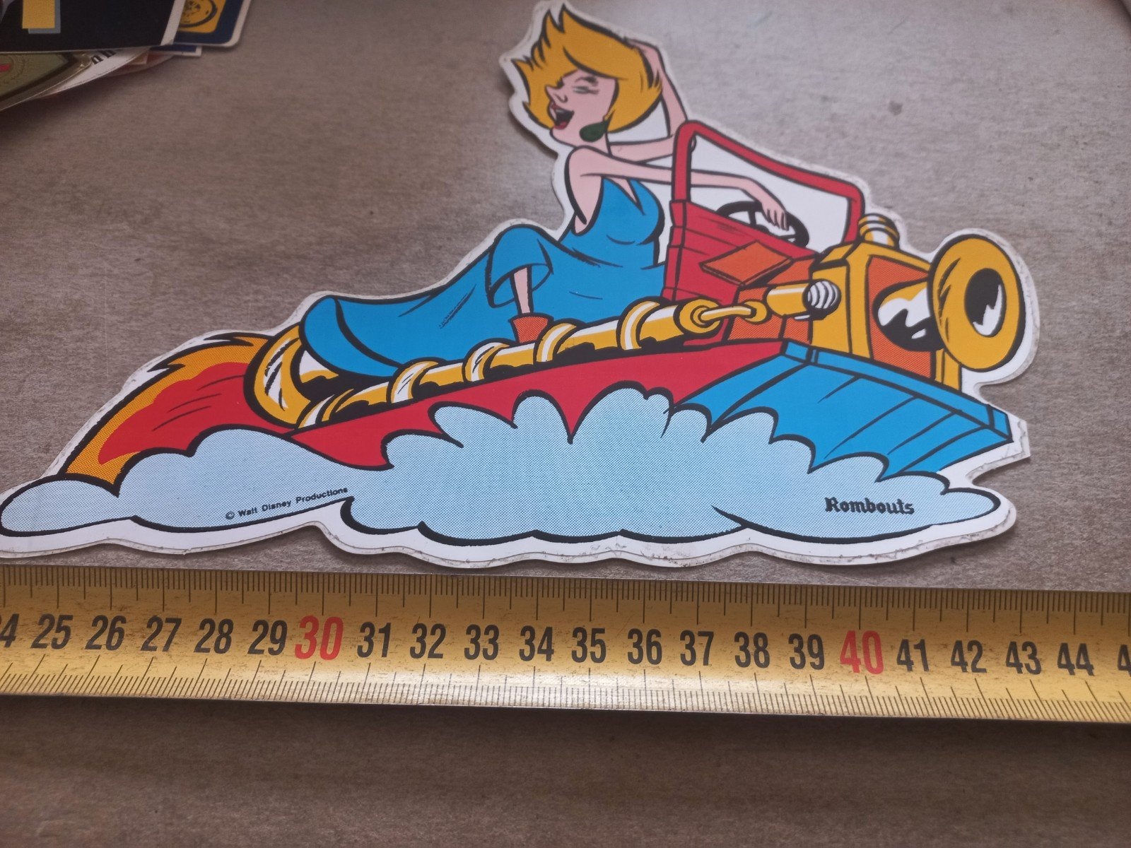 Vintage Disney Rombouts Sticker - Vrouw op Voertuig, Ophalen of Verzenden, Gebruikt