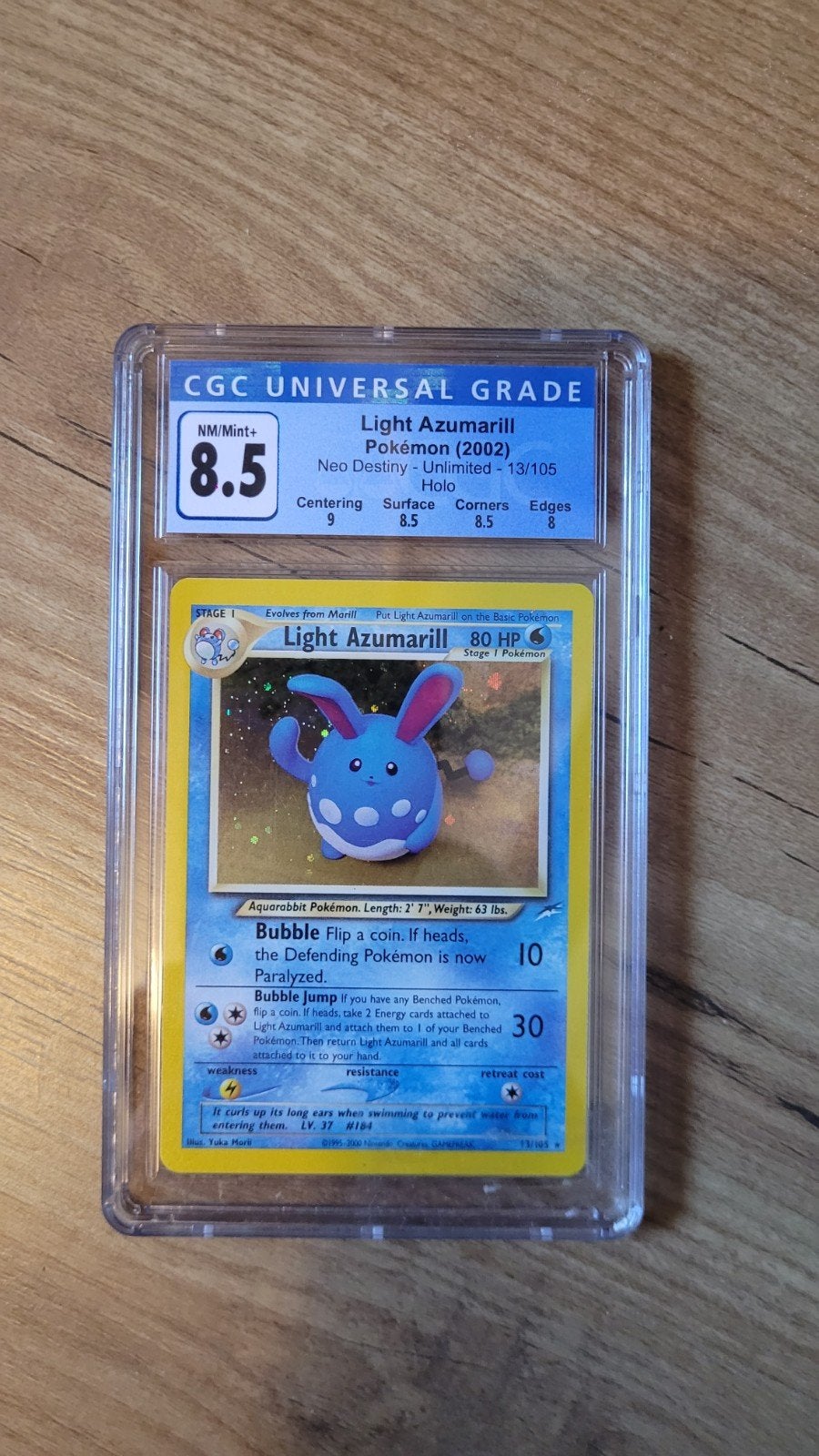 Light Azumarill Pokémon Kaart CGC 8.5 NM/Mint+ Neo Destiny, Ophalen of Verzenden, Zo goed als nieuw, Losse kaart