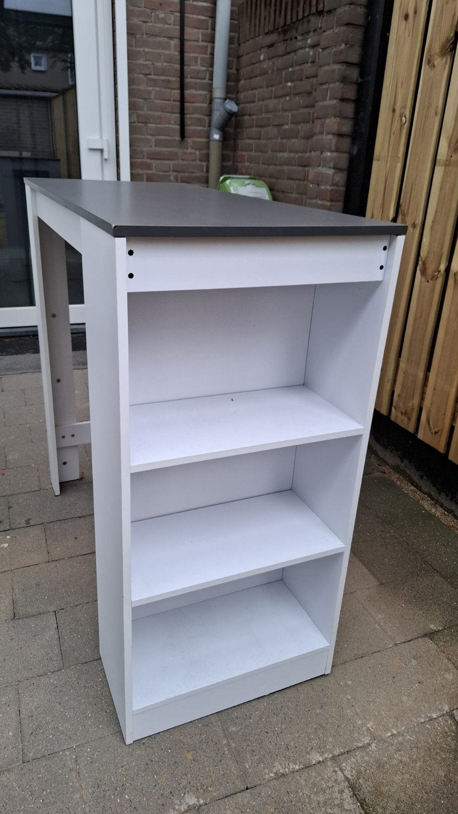 Bar met vakken aan de zijkant, Ophalen, Zo goed als nieuw