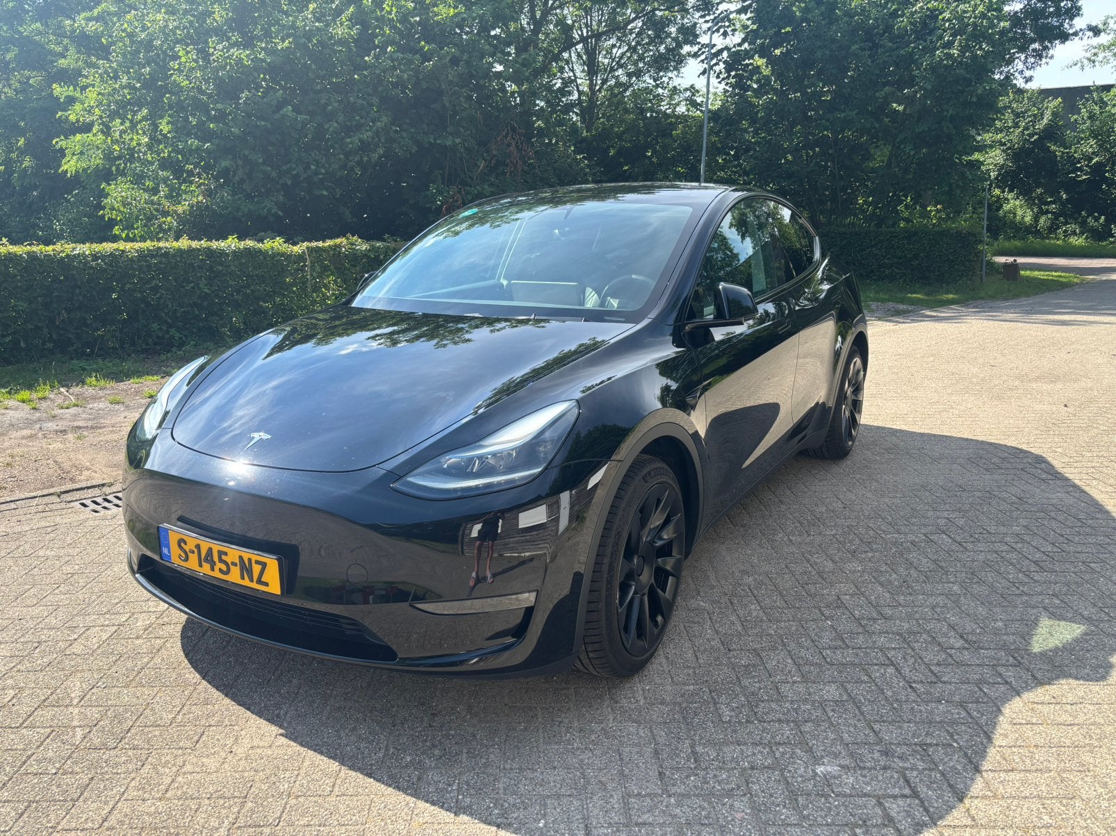 Tesla Model Y 2023 Zwart, Auto's, Tesla, Particulier, Model Y, 4x4, ABS, Achteruitrijcamera, Adaptieve lichten, Adaptive Cruise Control