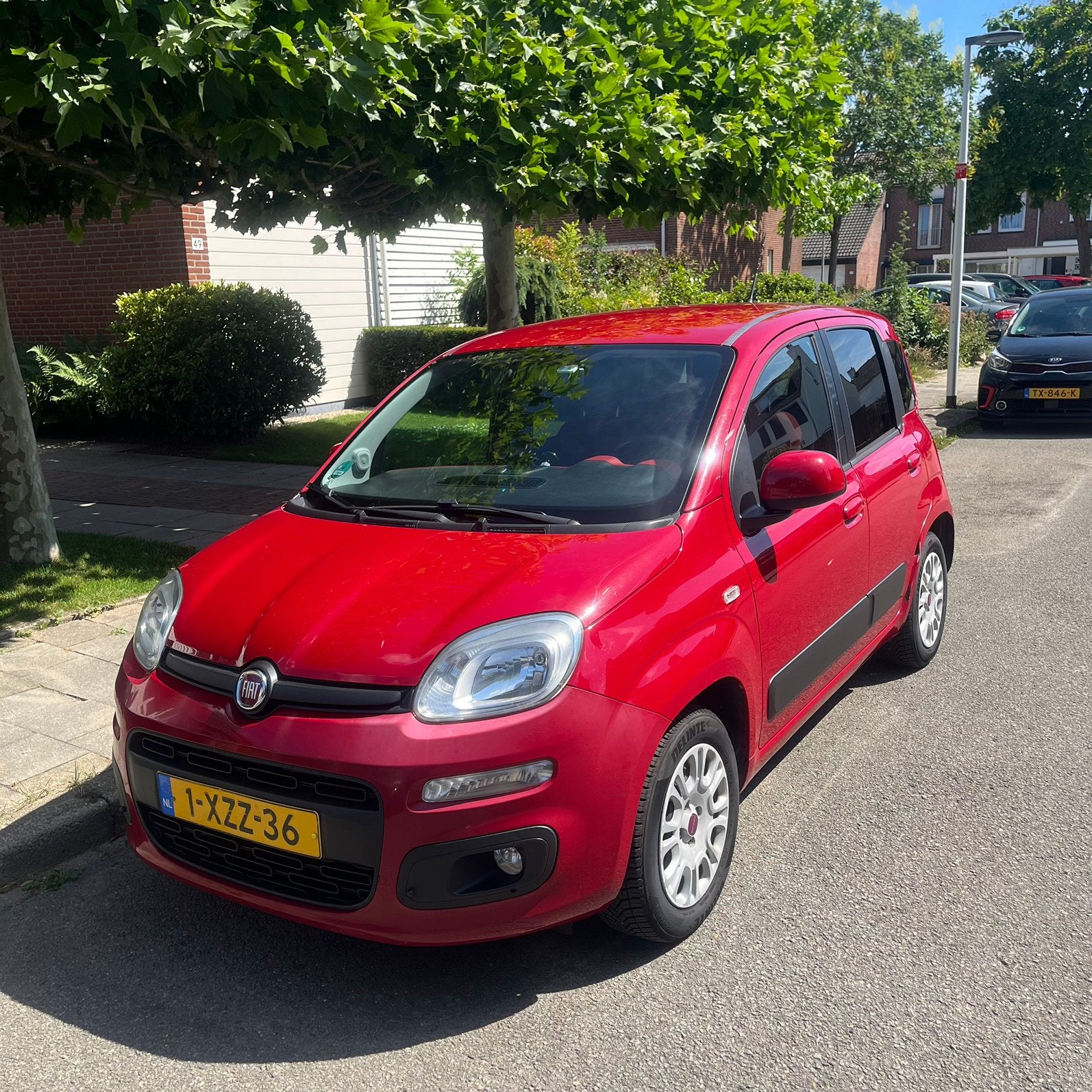 Fiat Panda 0.9 Twinair 59KW 2014 Rood, Auto's, Voorwielaandrijving, 31 €/maand, Panda, Leder en Stof