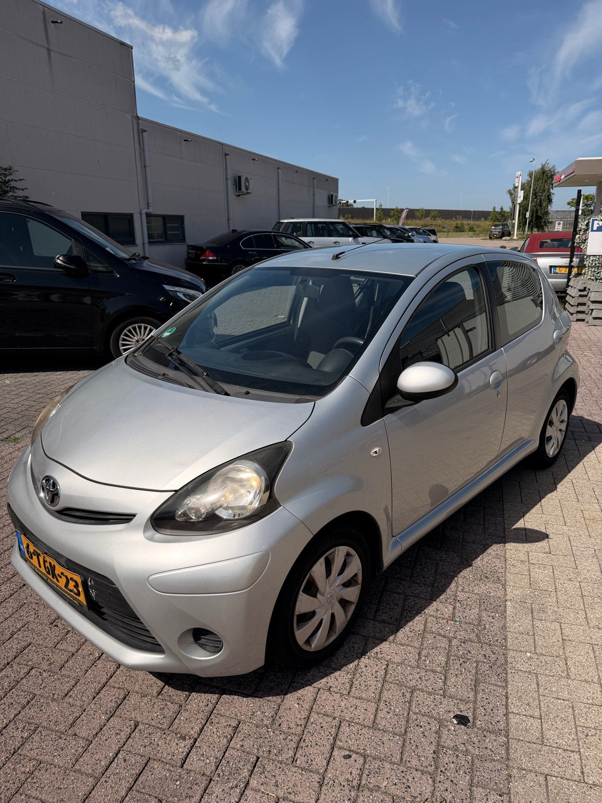 Toyota Aygo 1.0 12V Vvt-i 5DRS 2013 Grijs, Voorwielaandrijving, Stof, Zwart, 4 stoelen