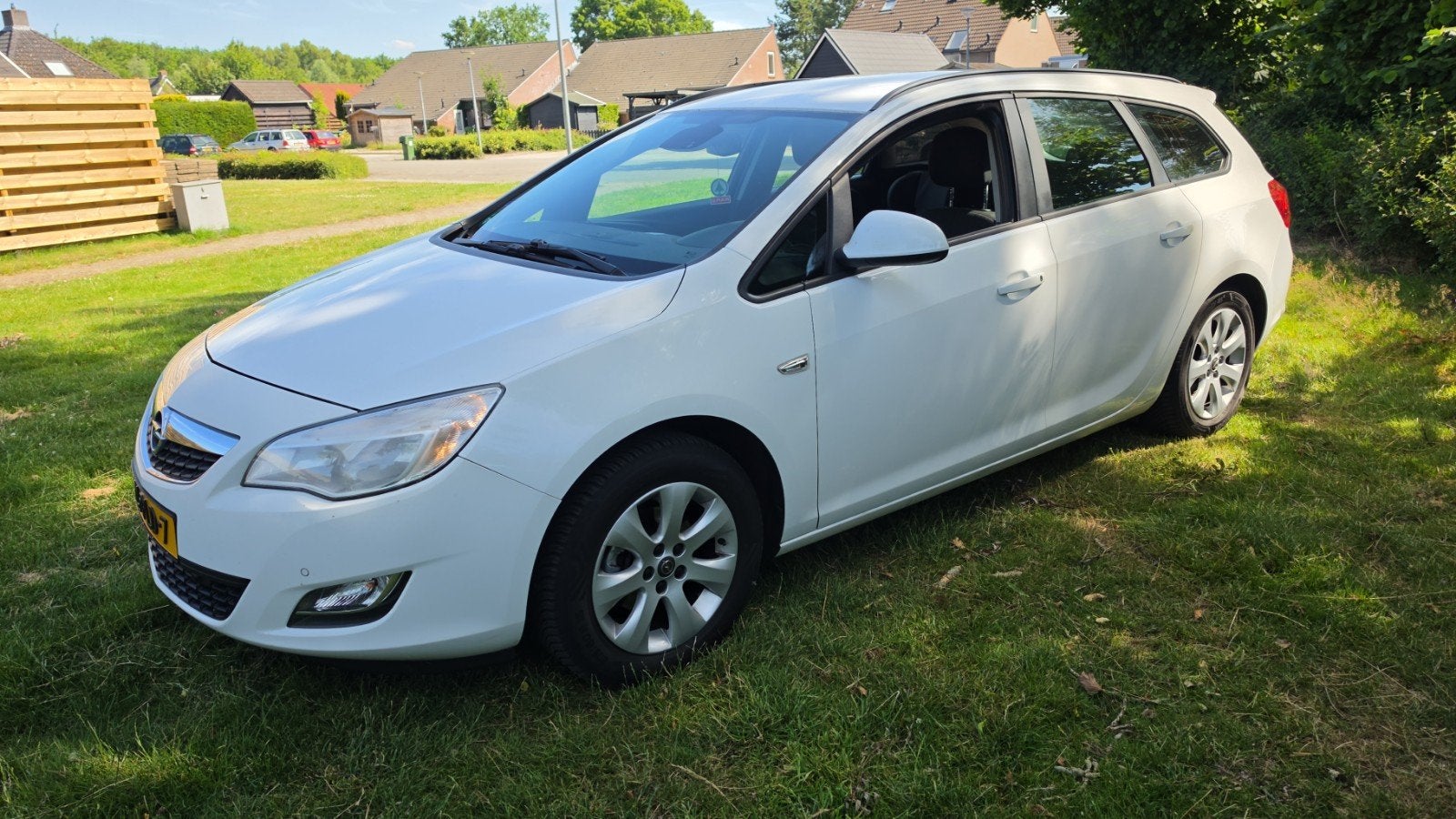 Opel Astra 1.4 Turbo 88KW Sports Tourer 2011 Wit, Auto's, Voorwielaandrijving, 4 cilinders, 1337 kg, Wit
