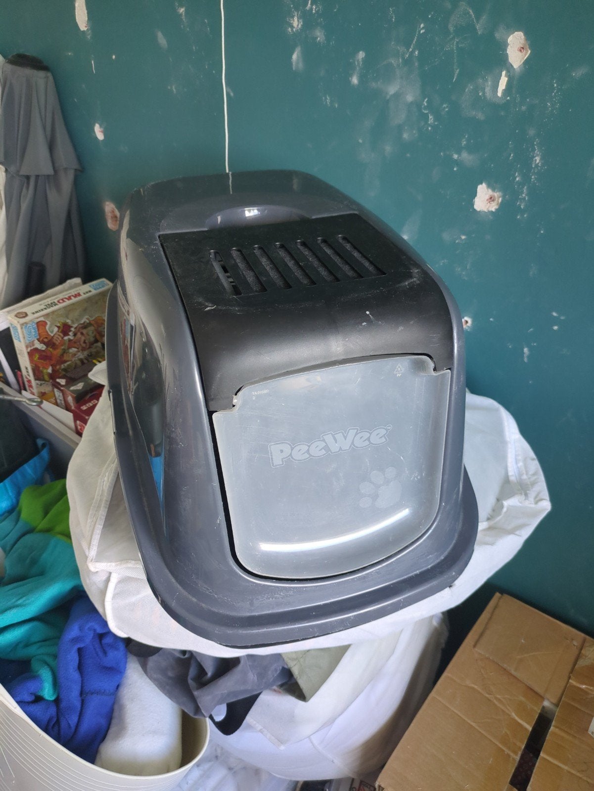 Peewee kattenbak klein, Ophalen