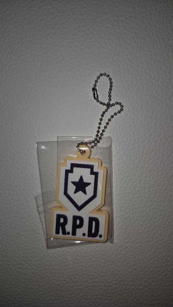 Resident Evil 30th Anniversary RPD Keychain Capcom, Ophalen of Verzenden, Nieuw