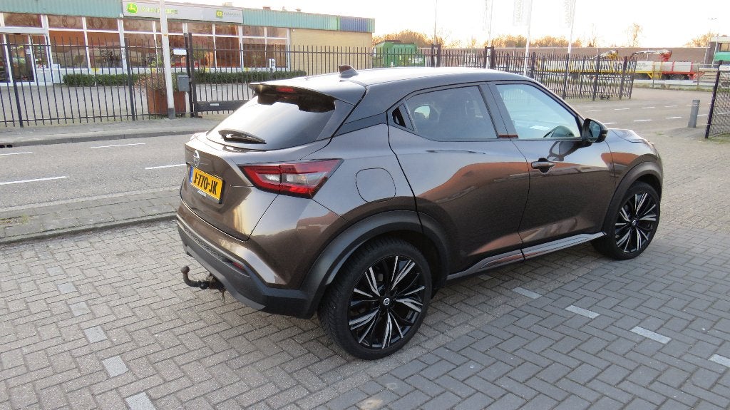 Nissan Juke 1.0 Dig-t 117pk DCT Bj 2020 Bruin Automaat, Auto's, 1250 kg, Bruin, Bedrijf, 3 cilinders
