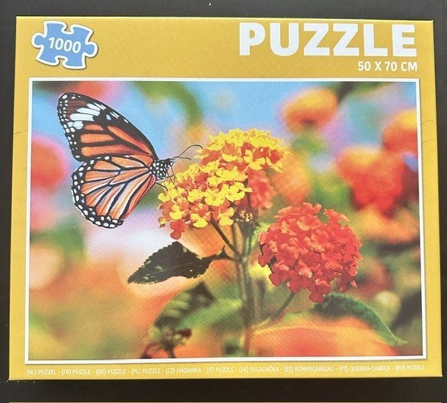Puzzel met vlinder en bloemen, 1000 stukjes zgan (Sp21), Ophalen of Verzenden, 500 t/m 1500 stukjes, Zo goed als nieuw, Legpuzzel