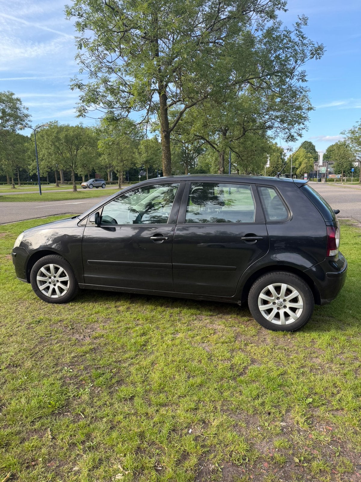 Volkswagen Polo 1.4 16V 59KW 2007 Zwart, Auto's, Volkswagen, Voorwielaandrijving, 4 cilinders, Zwart, Handgeschakeld