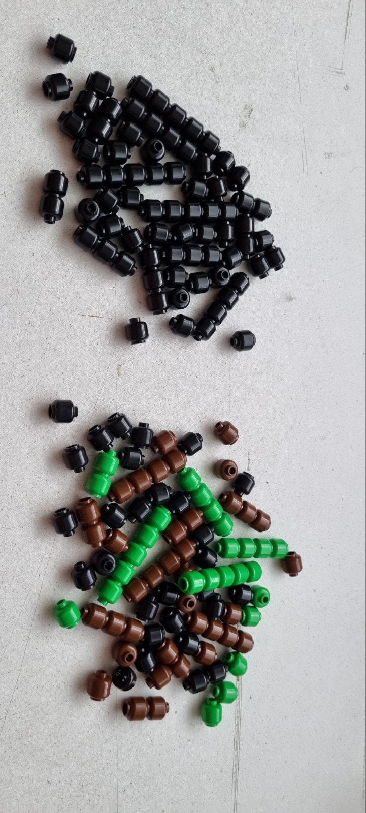 Grote partij Lego hoofdjes - zwart, bruin, groen, Kinderen en Baby's, Speelgoed | Duplo en Lego, Ophalen of Verzenden, Gebruikt