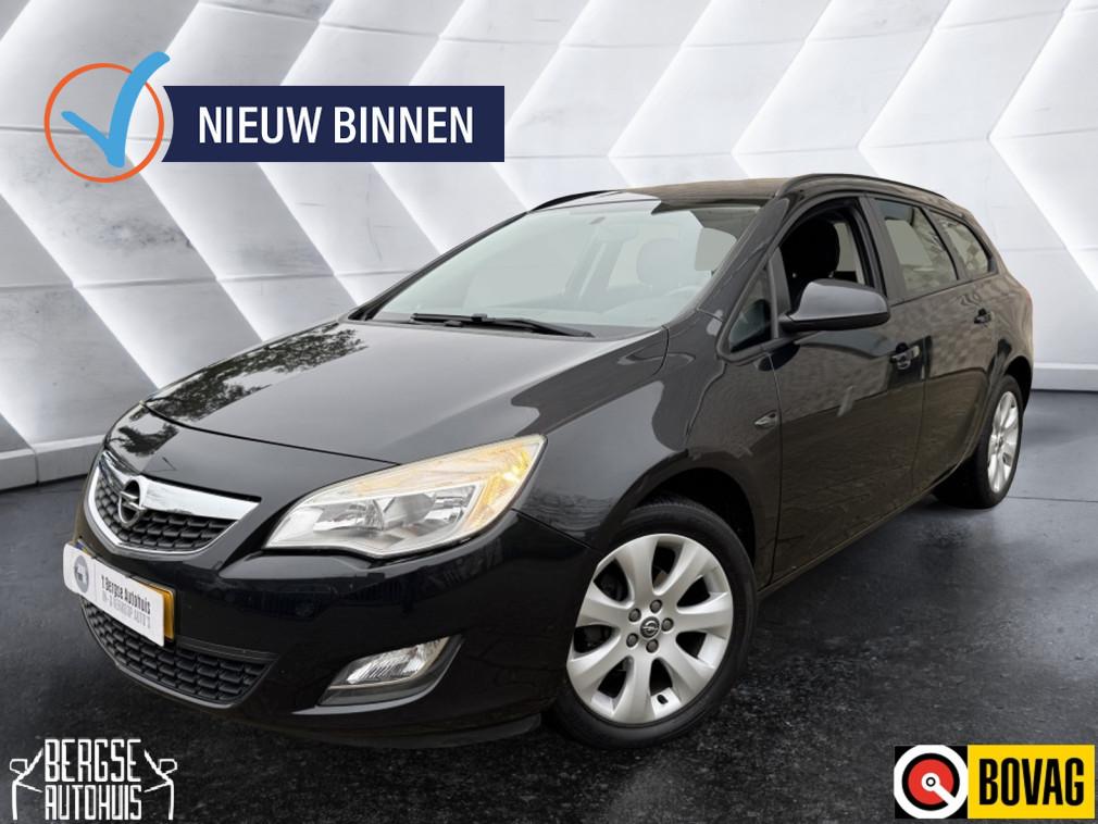 Opel Astra Sports Tourer 1.4 Turbo Bns + Airco Cruise Navi, Voorwielaandrijving, Euro 5, Stof, Gebruikt