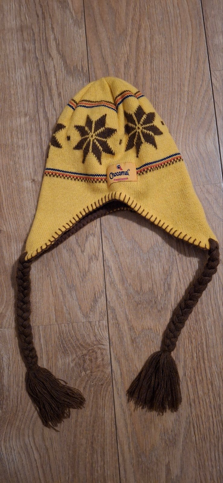 Unieke Chocomel Muts - Geel met Bruine Details, Chocomel, Ophalen of Verzenden, Zo goed als nieuw, Muts