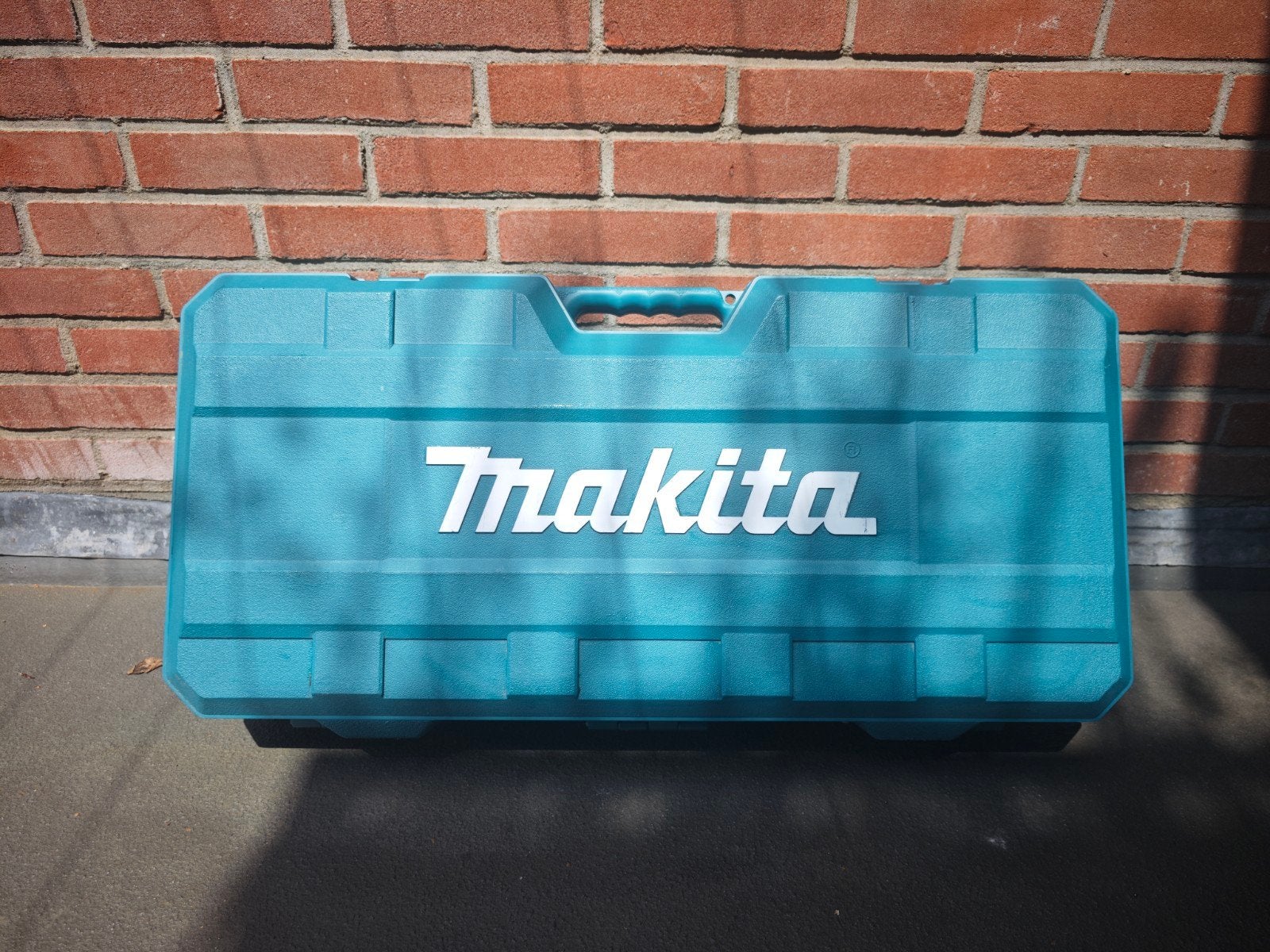 Makita Koffer DK0053G voor haakse slijpers, Verzenden