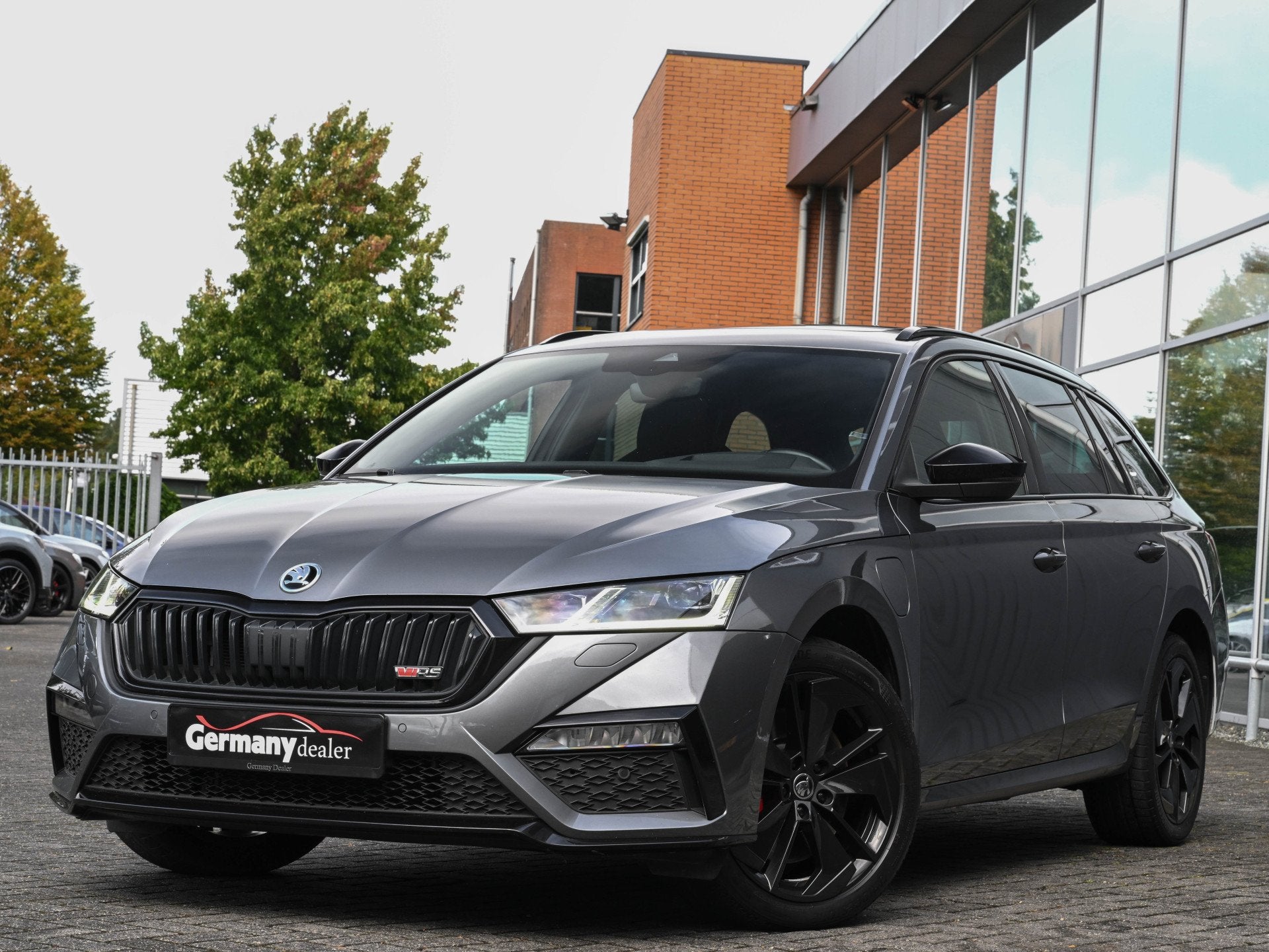 Skoda Octavia Combi 1.4 TSI 245pk RS iV PHEV Business Pano H, Auto's, Gebruikt, Zwart, 4 cilinders, Met garantie (alle)