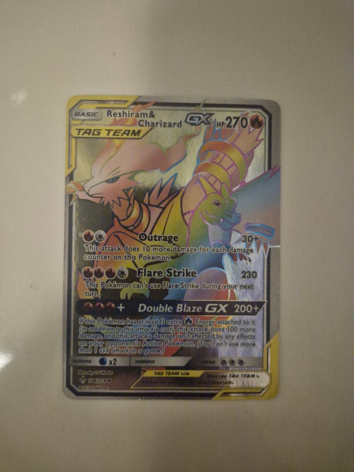 Reshiram & Charizard GX TAG TEAM Pokémonkaart, Ophalen of Verzenden, Zo goed als nieuw, Losse kaart, Foil